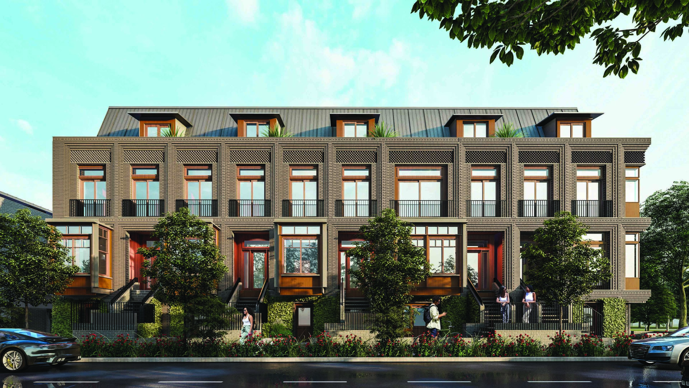Aurevi townhome community — brick façades and a tree-lined street